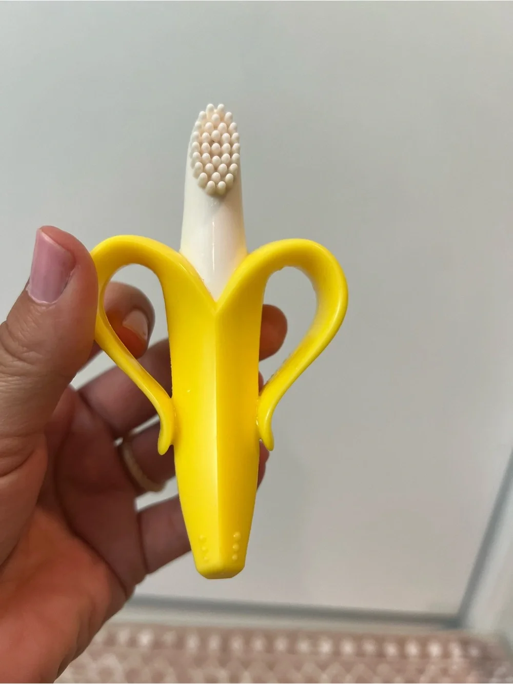 Nuby teething ring, necklace, Yellow Banana Silicone Finger Toothbrush for Kids